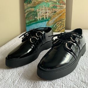 Black platform loafers
